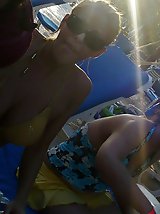 12 pictures - Approaching bikini girls so closely