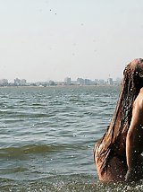 12 pictures - Horniest bikini slip voyeured on cam