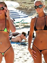 12 pictures - A bikini girl going topless on the La Joya Nude