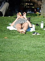 12 pictures - Peek up skirt, of babe in striped dress. Upskirt gallery