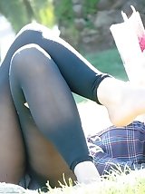12 pictures - Ragged pantyhose on slim legs. The real upskirt